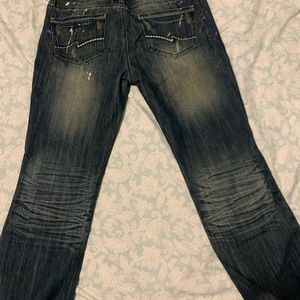 ripped paint splatter jeans